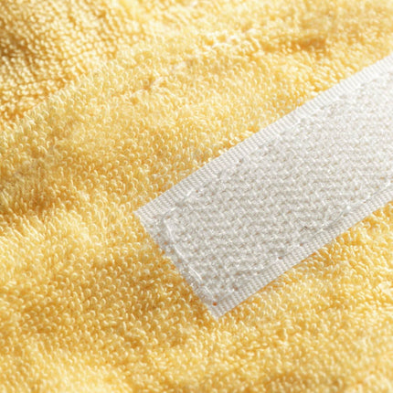 BeautyKit geltona galvos juosta salone – tvirtai fiksuoja plaukus veido priežiūros ir kosmetologinių procedūrų metu
