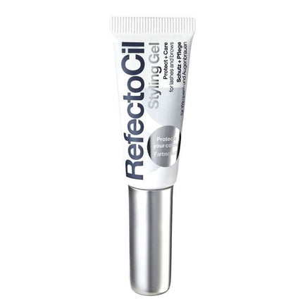 Styling gel tube for eyelashes and brows with silver cap on white background