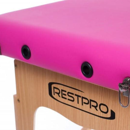 Tvirtos konstrukcijos RESTPRO Classic-2 rožinė kušetė anticeliulitinėms ir relaksacinėms procedūroms
